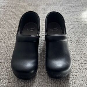 Dansko Sleek Black Leather Clogs